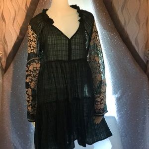 Green long sleeved embroidered boho dress by free people